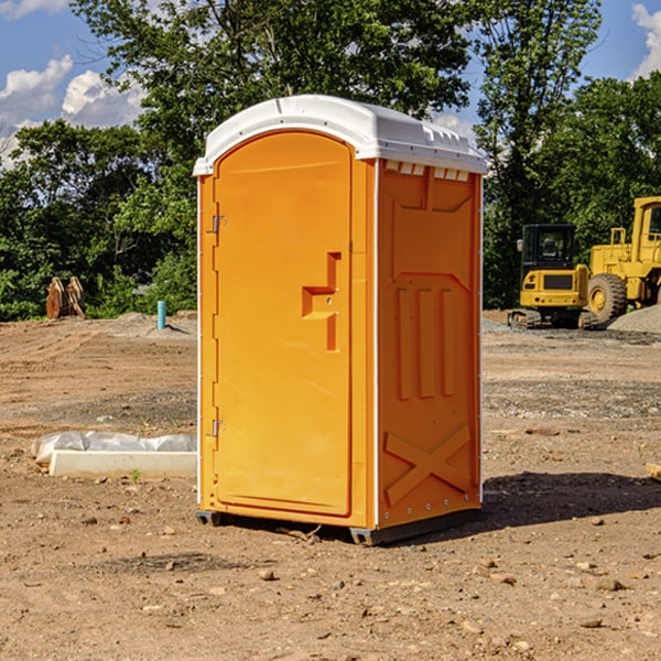 what is the cost difference between standard and deluxe portable toilet rentals in Hubbard